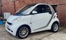 USED 2011 11 SMART FORTWO 1.0 MHD PASSION NAV SOFT TOUCH AUTOMATIC COUPE 2 DOOR *AUTOMATIC*ONLY &pound;20 ROAD TAX*GLASS PANORAMIC ROOF*SAT NAV*AIR CON*ALLOY WHEELS*THE CAR HAS HAD 8 SERVICES AND COMES WITH BRAND NEW MOT AND SERVICE*