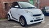 USED 2011 11 SMART FORTWO 1.0 MHD PASSION NAV SOFT TOUCH AUTOMATIC COUPE 2 DOOR *AUTOMATIC*ONLY &pound;20 ROAD TAX*GLASS PANORAMIC ROOF*SAT NAV*AIR CON*ALLOY WHEELS*THE CAR HAS HAD 8 SERVICES AND COMES WITH BRAND NEW MOT AND SERVICE*