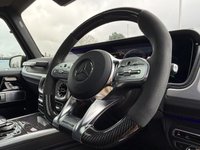 USED 2023 23 MERCEDES-BENZ G-CLASS 4.0 G63 V8 BiTurbo AMG Carbon Edition SUV 5dr Petrol SpdS+9GT 4MATIC Euro 6 (s/s) (585 ps) Black Exclusive Nappa Leather, G-MANUFAKTUR Package, Carbon Fibre Interior Trim, Carbon Fibre AMG Performance Steering Wheel, Rear Entertainment System, AMG Night Package, G-MANUFAKTUR Bumpers And Flared Arches In Obsidian Black, G-MAUNUFAKTUR Obsidian Black Roof, 22" AMG Cross Spoke Forged Wheels, AMG Brake Calipers In Red, Sliding Sunroof, Tinted Windows, AMG Sports Exhaust, Stainless Steel Running Boards, Driver Assist Package, Adaptive Cruise, Lane Keeping Assist, Blind Spot Assist, Traffic