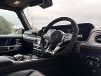USED 2023 23 MERCEDES-BENZ G-CLASS 4.0 G63 V8 BiTurbo AMG Carbon Edition SUV 5dr Petrol SpdS+9GT 4MATIC Euro 6 (s/s) (585 ps) Black Exclusive Nappa Leather, G-MANUFAKTUR Package, Carbon Fibre Interior Trim, Carbon Fibre AMG Performance Steering Wheel, Rear Entertainment System, AMG Night Package, G-MANUFAKTUR Bumpers And Flared Arches In Obsidian Black, G-MAUNUFAKTUR Obsidian Black Roof, 22" AMG Cross Spoke Forged Wheels, AMG Brake Calipers In Red, Sliding Sunroof, Tinted Windows, AMG Sports Exhaust, Stainless Steel Running Boards, Driver Assist Package, Adaptive Cruise, Lane Keeping Assist, Blind Spot Assist, Traffic