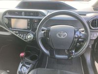 USED 2015 TOYOTA AQUA 1.5 Gs Sport Edition Automatic Hybrid Petrol Black 5dr JAPANESE IMPORTED TOYOTA AQUA / PRIUS CITY .1.5 Gs SPORT EDITION. CLEAN CONDITION THROUGHOUT. FINIHSED IN METALLIC BLACK COLOUR. SPEC INCLUDES PRIVACY GLASS, ALLOY WHEELS, CLIMATE CONTROL, A/C, PART LEATHER INTERIOR, ISOFIX, TRACTION CONTROL, ELECTRIC WINDOWS AND MIRRORS + 3 MONTHS WARRANTY + 12 MONTHS AA BREAKDOWN COVER INCLUDED