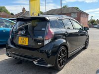 USED 2015 TOYOTA AQUA 1.5 Gs Sport Edition Automatic Hybrid Petrol Black 5dr JAPANESE IMPORTED TOYOTA AQUA / PRIUS CITY .1.5 Gs SPORT EDITION. CLEAN CONDITION THROUGHOUT. FINIHSED IN METALLIC BLACK COLOUR. SPEC INCLUDES PRIVACY GLASS, ALLOY WHEELS, CLIMATE CONTROL, A/C, PART LEATHER INTERIOR, ISOFIX, TRACTION CONTROL, ELECTRIC WINDOWS AND MIRRORS + 3 MONTHS WARRANTY + 12 MONTHS AA BREAKDOWN COVER INCLUDED