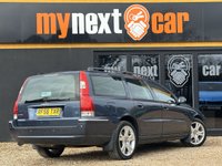 USED 2006 56 VOLVO V70 2.4 SE Estate 5dr Petrol Manual (221 g/km, 170 bhp) 1 OWNER FROM NEW + FULL VOLVO SERVICE HISTORY (18 VOLVO STAMPS) + ULTRA LOW MILEAGE 34K + FINISHED IN BARENTS BLUE WITH FULL BLACK LEATHER SEATS + WALNUT INTERIOR TRIM + ROOF RAILS + REAR PARKING SENSORS + CRUISE CONTROL + AIRCON + MULTIFUNCTIONAL STEERING WHEEL + 17" ALLOY WHEELS + ULEZ COMPLIANT + HPI CLEAR + 2 KEYS