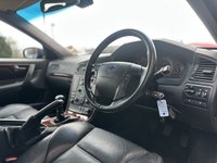 USED 2006 56 VOLVO V70 2.4 SE Estate 5dr Petrol Manual (221 g/km, 170 bhp) 1 OWNER FROM NEW + FULL VOLVO SERVICE HISTORY (18 VOLVO STAMPS) + ULTRA LOW MILEAGE 34K + FINISHED IN BARENTS BLUE WITH FULL BLACK LEATHER SEATS + WALNUT INTERIOR TRIM + ROOF RAILS + REAR PARKING SENSORS + CRUISE CONTROL + AIRCON + MULTIFUNCTIONAL STEERING WHEEL + 17" ALLOY WHEELS + ULEZ COMPLIANT + HPI CLEAR + 2 KEYS