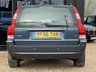 USED 2006 56 VOLVO V70 2.4 SE Estate 5dr Petrol Manual (221 g/km, 170 bhp) 1 OWNER FROM NEW + FULL VOLVO SERVICE HISTORY (18 VOLVO STAMPS) + ULTRA LOW MILEAGE 34K + FINISHED IN BARENTS BLUE WITH FULL BLACK LEATHER SEATS + WALNUT INTERIOR TRIM + ROOF RAILS + REAR PARKING SENSORS + CRUISE CONTROL + AIRCON + MULTIFUNCTIONAL STEERING WHEEL + 17" ALLOY WHEELS + ULEZ COMPLIANT + HPI CLEAR + 2 KEYS
