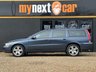 USED 2006 56 VOLVO V70 2.4 SE Estate 5dr Petrol Manual (221 g/km, 170 bhp) 1 OWNER FROM NEW + FULL VOLVO SERVICE HISTORY (18 VOLVO STAMPS) + ULTRA LOW MILEAGE 34K + FINISHED IN BARENTS BLUE WITH FULL BLACK LEATHER SEATS + WALNUT INTERIOR TRIM + ROOF RAILS + REAR PARKING SENSORS + CRUISE CONTROL + AIRCON + MULTIFUNCTIONAL STEERING WHEEL + 17" ALLOY WHEELS + ULEZ COMPLIANT + HPI CLEAR + 2 KEYS