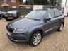 USED 2018 68 SKODA KAROQ 1.5 TSI SE L SUV 5dr Petrol Manual Euro 6 (s/s) (150 ps) ONE OWNER+8 INCH TOUCHSCREEN SATELLITE NAVIGATION SYSTEM+DAB DIGITAL RADIO+BLUETOOTH+DUAL ZONE CLIMATE CONTROL AIR-CONDITIONING+CRUISE CONTROL+ LUXURIOUS HEATED SEATS+AUTOMATIC HEADLIGHT ACTIVATION+RAIN-SENSING WINDSCREEN WIPERS+FRONT & REAR PARKING ASSISTANCE WITH PARKING CAMERA+'QUARTZ GREY' PAINT+18 INCH ALLOY WHEELS.