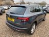 USED 2018 68 SKODA KAROQ 1.5 TSI SE L SUV 5dr Petrol Manual Euro 6 (s/s) (150 ps) ONE OWNER+8 INCH TOUCHSCREEN SATELLITE NAVIGATION SYSTEM+DAB DIGITAL RADIO+BLUETOOTH+DUAL ZONE CLIMATE CONTROL AIR-CONDITIONING+CRUISE CONTROL+ LUXURIOUS HEATED SEATS+AUTOMATIC HEADLIGHT ACTIVATION+RAIN-SENSING WINDSCREEN WIPERS+FRONT & REAR PARKING ASSISTANCE WITH PARKING CAMERA+'QUARTZ GREY' PAINT+18 INCH ALLOY WHEELS.