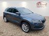 USED 2018 68 SKODA KAROQ 1.5 TSI SE L SUV 5dr Petrol Manual Euro 6 (s/s) (150 ps) ONE OWNER+8 INCH TOUCHSCREEN SATELLITE NAVIGATION SYSTEM+DAB DIGITAL RADIO+BLUETOOTH+DUAL ZONE CLIMATE CONTROL AIR-CONDITIONING+CRUISE CONTROL+ LUXURIOUS HEATED SEATS+AUTOMATIC HEADLIGHT ACTIVATION+RAIN-SENSING WINDSCREEN WIPERS+FRONT & REAR PARKING ASSISTANCE WITH PARKING CAMERA+'QUARTZ GREY' PAINT+18 INCH ALLOY WHEELS.