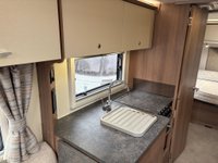USED 2026 BAILEY PHOENIX + 640 Panther Fixed Island Bed! Motor mover