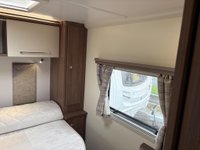 USED 2026 BAILEY PHOENIX + 640 Panther Fixed Island Bed! Motor mover
