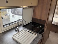 USED 2026 BAILEY PHOENIX + 640 Panther Fixed Island Bed! Motor mover