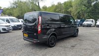 USED 2023 72 FORD TRANSIT CUSTOM Crewvan Double Cab Trail L2 H1 Tdci 130 PS LWB 320 With Air Conditioning, Full Electric Pack, Leather Seats, Alloy Whhels, Full Black Pack, Reverse Camera, Bulkhead, Ply Lining,Heated Screen. 1 Owner, 2 Keys, Service History @24,686 and will be serviced for you. In Great condition. Presenting a Ford Custom Crewvan Double Cab in the sought-after Trail specification. This L2 H1 long-wheelbase model offers the perfect balance of passenger comfort and commercial practicality, powered by a responsive 130 PS TDCi engine.  This one-owner vehicle comes with a comprehensive specification including air conditioning, a full electric pack, heated front screen, and a factory-fitted bulkhead. The interior features luxurious leather seats and a ply-lined load area for durability. Externally, it is enhanced by alloy wheels and the distinctive Full Black Pack. Manoeuvrability and safety are improved with the factory-fit reverse camera.  Offered with a full service history, having been recently serviced at 24,686 miles, and supplied with two keys. A complimentary full service will also be carried out prior to handover. This Crewvan is in excellent condition throughout, ready for its next owner. 