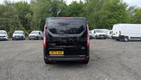 USED 2023 72 FORD TRANSIT CUSTOM Crewvan Double Cab Trail L2 H1 Tdci 130 PS LWB 320 With Air Conditioning, Full Electric Pack, Leather Seats, Alloy Whhels, Full Black Pack, Reverse Camera, Bulkhead, Ply Lining,Heated Screen. 1 Owner, 2 Keys, Service History @24,686 and will be serviced for you. In Great condition. Presenting a Ford Custom Crewvan Double Cab in the sought-after Trail specification. This L2 H1 long-wheelbase model offers the perfect balance of passenger comfort and commercial practicality, powered by a responsive 130 PS TDCi engine.  This one-owner vehicle comes with a comprehensive specification including air conditioning, a full electric pack, heated front screen, and a factory-fitted bulkhead. The interior features luxurious leather seats and a ply-lined load area for durability. Externally, it is enhanced by alloy wheels and the distinctive Full Black Pack. Manoeuvrability and safety are improved with the factory-fit reverse camera.  Offered with a full service history, having been recently serviced at 24,686 miles, and supplied with two keys. A complimentary full service will also be carried out prior to handover. This Crewvan is in excellent condition throughout, ready for its next owner. 