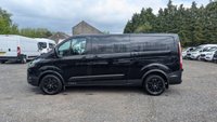 USED 2023 72 FORD TRANSIT CUSTOM Crewvan Double Cab Trail L2 H1 Tdci 130 PS LWB 320 With Air Conditioning, Full Electric Pack, Leather Seats, Alloy Whhels, Full Black Pack, Reverse Camera, Bulkhead, Ply Lining,Heated Screen. 1 Owner, 2 Keys, Service History @24,686 and will be serviced for you. In Great condition. Presenting a Ford Custom Crewvan Double Cab in the sought-after Trail specification. This L2 H1 long-wheelbase model offers the perfect balance of passenger comfort and commercial practicality, powered by a responsive 130 PS TDCi engine.  This one-owner vehicle comes with a comprehensive specification including air conditioning, a full electric pack, heated front screen, and a factory-fitted bulkhead. The interior features luxurious leather seats and a ply-lined load area for durability. Externally, it is enhanced by alloy wheels and the distinctive Full Black Pack. Manoeuvrability and safety are improved with the factory-fit reverse camera.  Offered with a full service history, having been recently serviced at 24,686 miles, and supplied with two keys. A complimentary full service will also be carried out prior to handover. This Crewvan is in excellent condition throughout, ready for its next owner. 