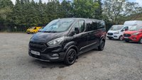 USED 2023 72 FORD TRANSIT CUSTOM Crewvan Double Cab Trail L2 H1 Tdci 130 PS LWB 320 With Air Conditioning, Full Electric Pack, Leather Seats, Alloy Whhels, Full Black Pack, Reverse Camera, Bulkhead, Ply Lining,Heated Screen. 1 Owner, 2 Keys, Service History @24,686 and will be serviced for you. In Great condition. Presenting a Ford Custom Crewvan Double Cab in the sought-after Trail specification. This L2 H1 long-wheelbase model offers the perfect balance of passenger comfort and commercial practicality, powered by a responsive 130 PS TDCi engine.  This one-owner vehicle comes with a comprehensive specification including air conditioning, a full electric pack, heated front screen, and a factory-fitted bulkhead. The interior features luxurious leather seats and a ply-lined load area for durability. Externally, it is enhanced by alloy wheels and the distinctive Full Black Pack. Manoeuvrability and safety are improved with the factory-fit reverse camera.  Offered with a full service history, having been recently serviced at 24,686 miles, and supplied with two keys. A complimentary full service will also be carried out prior to handover. This Crewvan is in excellent condition throughout, ready for its next owner. 