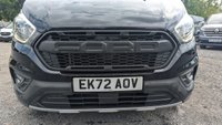USED 2023 72 FORD TRANSIT CUSTOM Crewvan Double Cab Trail L2 H1 Tdci 130 PS LWB 320 With Air Conditioning, Full Electric Pack, Leather Seats, Alloy Whhels, Full Black Pack, Reverse Camera, Bulkhead, Ply Lining,Heated Screen. 1 Owner, 2 Keys, Service History @24,686 and will be serviced for you. In Great condition. Presenting a Ford Custom Crewvan Double Cab in the sought-after Trail specification. This L2 H1 long-wheelbase model offers the perfect balance of passenger comfort and commercial practicality, powered by a responsive 130 PS TDCi engine.  This one-owner vehicle comes with a comprehensive specification including air conditioning, a full electric pack, heated front screen, and a factory-fitted bulkhead. The interior features luxurious leather seats and a ply-lined load area for durability. Externally, it is enhanced by alloy wheels and the distinctive Full Black Pack. Manoeuvrability and safety are improved with the factory-fit reverse camera.  Offered with a full service history, having been recently serviced at 24,686 miles, and supplied with two keys. A complimentary full service will also be carried out prior to handover. This Crewvan is in excellent condition throughout, ready for its next owner. 