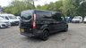USED 2023 72 FORD TRANSIT CUSTOM Crewvan Double Cab Trail L2 H1 Tdci 130 PS LWB 320 With Air Conditioning, Full Electric Pack, Leather Seats, Alloy Whhels, Full Black Pack, Reverse Camera, Bulkhead, Ply Lining,Heated Screen. 1 Owner, 2 Keys, Service History @24,686 and will be serviced for you. In Great condition. Presenting a Ford Custom Crewvan Double Cab in the sought-after Trail specification. This L2 H1 long-wheelbase model offers the perfect balance of passenger comfort and commercial practicality, powered by a responsive 130 PS TDCi engine.  This one-owner vehicle comes with a comprehensive specification including air conditioning, a full electric pack, heated front screen, and a factory-fitted bulkhead. The interior features luxurious leather seats and a ply-lined load area for durability. Externally, it is enhanced by alloy wheels and the distinctive Full Black Pack. Manoeuvrability and safety are improved with the factory-fit reverse camera.  Offered with a full service history, having been recently serviced at 24,686 miles, and supplied with two keys. A complimentary full service will also be carried out prior to handover. This Crewvan is in excellent condition throughout, ready for its next owner. 
