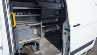 USED 2019 19 FORD TRANSIT CUSTOM L2 H2 LEADER 340 TDCI 130 PS LWB High Roof With Air Conditioning, Electric Windows, Racked Ready for work, Parking Sensors, Security Locks, Bulkhead in great condition . 1 Owner from New - 2 Keys - 6 Service Stamps in the book (Last Serviced @ 90,567 miles) . Presenting a superb example of a hard-working and well-maintained light commercial vehicle, this Ford Custom L2 H2 Leader 340 TDCI is ready to roll. Finished in a clean and professional white, this L2 H2 high roof variant offers the ideal combination of spacious cargo volume and urban-friendly dimensions.  Under the bonnet sits the reliable and punchy 130 PS Duratorq diesel engine, providing ample power for motorway miles and fully laden loads. This is a one-owner-from-new vehicle, which speaks volumes about its careful history. It comes complete with both original keys and a comprehensive service book stamped six times, with the most recent service completed at 90,567 miles, ensuring it is ready for the next chapter of its working life.  Step inside to find a practical and comfortable cabin equipped with air conditioning for year-round comfort and electric front windows for convenience. The interior also features a heavy-duty bulkhead, providing crucial protection for the driver and separation from the load area.  The van is immediately work-ready, with the cargo bay already professionally racked out to keep tools and equipment organised and secure. Manoeuvring and parking in tight spots is made significantly easier thanks to the inclusion of rear parking sensors. Added security is provided by fitted security locks, offering peace of mind when the van is left unattended.  This Ford Custom is presented in great condition throughout, reflecting its single-owner history and regular maintenance. It represents a fantastic opportunity for any tradesperson or business looking for a dependable, well-specced, and ready-to-go workhorse. 