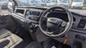USED 2019 19 FORD TRANSIT CUSTOM L2 H2 LEADER 340 TDCI 130 PS LWB High Roof With Air Conditioning, Electric Windows, Racked Ready for work, Parking Sensors, Security Locks, Bulkhead in great condition . 1 Owner from New - 2 Keys - 6 Service Stamps in the book (Last Serviced @ 90,567 miles) . Presenting a superb example of a hard-working and well-maintained light commercial vehicle, this Ford Custom L2 H2 Leader 340 TDCI is ready to roll. Finished in a clean and professional white, this L2 H2 high roof variant offers the ideal combination of spacious cargo volume and urban-friendly dimensions.  Under the bonnet sits the reliable and punchy 130 PS Duratorq diesel engine, providing ample power for motorway miles and fully laden loads. This is a one-owner-from-new vehicle, which speaks volumes about its careful history. It comes complete with both original keys and a comprehensive service book stamped six times, with the most recent service completed at 90,567 miles, ensuring it is ready for the next chapter of its working life.  Step inside to find a practical and comfortable cabin equipped with air conditioning for year-round comfort and electric front windows for convenience. The interior also features a heavy-duty bulkhead, providing crucial protection for the driver and separation from the load area.  The van is immediately work-ready, with the cargo bay already professionally racked out to keep tools and equipment organised and secure. Manoeuvring and parking in tight spots is made significantly easier thanks to the inclusion of rear parking sensors. Added security is provided by fitted security locks, offering peace of mind when the van is left unattended.  This Ford Custom is presented in great condition throughout, reflecting its single-owner history and regular maintenance. It represents a fantastic opportunity for any tradesperson or business looking for a dependable, well-specced, and ready-to-go workhorse. 