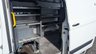 USED 2019 19 FORD TRANSIT CUSTOM L2 H2 LEADER 340 TDCI 130 PS LWB High Roof With Air Conditioning, Electric Windows, Racked Ready for work, Parking Sensors, Security Locks, Bulkhead in great condition . 1 Owner from New - 2 Keys - 6 Service Stamps in the book (Last Serviced @ 90,567 miles) . Presenting a superb example of a hard-working and well-maintained light commercial vehicle, this Ford Custom L2 H2 Leader 340 TDCI is ready to roll. Finished in a clean and professional white, this L2 H2 high roof variant offers the ideal combination of spacious cargo volume and urban-friendly dimensions.  Under the bonnet sits the reliable and punchy 130 PS Duratorq diesel engine, providing ample power for motorway miles and fully laden loads. This is a one-owner-from-new vehicle, which speaks volumes about its careful history. It comes complete with both original keys and a comprehensive service book stamped six times, with the most recent service completed at 90,567 miles, ensuring it is ready for the next chapter of its working life.  Step inside to find a practical and comfortable cabin equipped with air conditioning for year-round comfort and electric front windows for convenience. The interior also features a heavy-duty bulkhead, providing crucial protection for the driver and separation from the load area.  The van is immediately work-ready, with the cargo bay already professionally racked out to keep tools and equipment organised and secure. Manoeuvring and parking in tight spots is made significantly easier thanks to the inclusion of rear parking sensors. Added security is provided by fitted security locks, offering peace of mind when the van is left unattended.  This Ford Custom is presented in great condition throughout, reflecting its single-owner history and regular maintenance. It represents a fantastic opportunity for any tradesperson or business looking for a dependable, well-specced, and ready-to-go workhorse. 