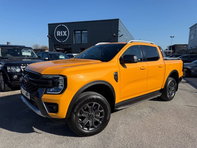 2023 FORD RANGER 2.0 TD EcoBlue Wildtrak Pickup Double Cab 4dr Diesel Auto 4WD Euro 6-1 OWNER FROM NEW FANTASTIC EXAMPLE FINISHED IN CYBER ORANGE-WITH BLACK LEATHER UPHOLSTERY AND ORANGE STITCHING-TOW PACK-ELECTRIC ROLLER SHUTTER-HEATED SEATS AND STEERING WHEEL-BLUETOOTH-CRUISE CONTROL-SATNAV-REVERSE CAMERA-DAB RADIO-CAR PLAY-DUAL ZONE CLIMATE CONTROL - Photo 2
