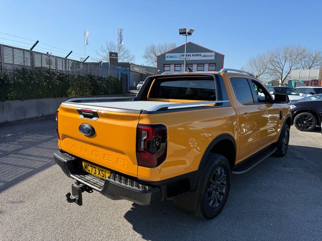 2023 FORD RANGER 2.0 TD EcoBlue Wildtrak Pickup Double Cab 4dr Diesel Auto 4WD Euro 6-1 OWNER FROM NEW FANTASTIC EXAMPLE FINISHED IN CYBER ORANGE-WITH BLACK LEATHER UPHOLSTERY AND ORANGE STITCHING-TOW PACK-ELECTRIC ROLLER SHUTTER-HEATED SEATS AND STEERING WHEEL-BLUETOOTH-CRUISE CONTROL-SATNAV-REVERSE CAMERA-DAB RADIO-CAR PLAY-DUAL ZONE CLIMATE CONTROL - Photo 12