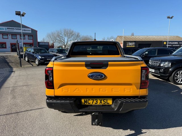 2023 FORD RANGER 2.0 TD EcoBlue Wildtrak Pickup Double Cab 4dr Diesel Auto 4WD Euro 6-1 OWNER FROM NEW FANTASTIC EXAMPLE FINISHED IN CYBER ORANGE-WITH BLACK LEATHER UPHOLSTERY AND ORANGE STITCHING-TOW PACK-ELECTRIC ROLLER SHUTTER-HEATED SEATS AND STEERING WHEEL-BLUETOOTH-CRUISE CONTROL-SATNAV-REVERSE CAMERA-DAB RADIO-CAR PLAY-DUAL ZONE CLIMATE CONTROL - Photo 6