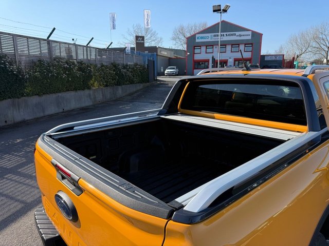 2023 FORD RANGER 2.0 TD EcoBlue Wildtrak Pickup Double Cab 4dr Diesel Auto 4WD Euro 6-1 OWNER FROM NEW FANTASTIC EXAMPLE FINISHED IN CYBER ORANGE-WITH BLACK LEATHER UPHOLSTERY AND ORANGE STITCHING-TOW PACK-ELECTRIC ROLLER SHUTTER-HEATED SEATS AND STEERING WHEEL-BLUETOOTH-CRUISE CONTROL-SATNAV-REVERSE CAMERA-DAB RADIO-CAR PLAY-DUAL ZONE CLIMATE CONTROL - Photo 11