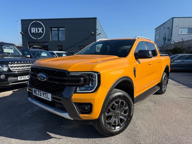 2023 FORD RANGER 2.0 TD EcoBlue Wildtrak Pickup Double Cab 4dr Diesel Auto 4WD Euro 6-1 OWNER FROM NEW FANTASTIC EXAMPLE FINISHED IN CYBER ORANGE-WITH BLACK LEATHER UPHOLSTERY AND ORANGE STITCHING-TOW PACK-ELECTRIC ROLLER SHUTTER-HEATED SEATS AND STEERING WHEEL-BLUETOOTH-CRUISE CONTROL-SATNAV-REVERSE CAMERA-DAB RADIO-CAR PLAY-DUAL ZONE CLIMATE CONTROL