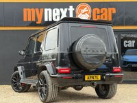 USED 2018 68 MERCEDES-BENZ G-CLASS 4.0 G63 V8 BiTurbo AMG SUV 5dr Petrol SpdS+9GT 4MATIC Euro 6 (s/s) (585 ps) URBAN WIDETRACK + UC-4 23" ALLOY WHEELS + TRUFFLE BROWN & BLACK INTERIOR + SUNROOF + CARBON STEERING WHEEL + CARBON SPOILER + CARBON BONNET VENTS + CARBON FRONT SPLITTER WITH DRL's + ACC