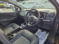 USED 2021 71 RENAULT ZOE Black R135 EV50 GT Line Hatchback, 39,533 miles, Rapid Charge Electric Automatic, Half leather, Sat Nav, Rear camera, Bluetooth, Air Conditioning . This 2021 Renault Zoe R135 GT Line is a superb example, having had only one owner since new. This electric hatchback boasts a 55 kWh battery offering a maximum range of 238 miles when new, making it ideal for both daily commutes and longer journeys. Charging is convenient, with a full charge at home using a 7kW charger taking  9 hours and 25 minutes, while rapid public charging can take you from empty to 80% in just 1 hour and 10 minutes. The vehicle comes with a 3 month warranty and a 12 month