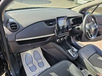 USED 2021 71 RENAULT ZOE Black R135 EV50 GT Line Hatchback, 39,533 miles, Rapid Charge Electric Automatic, Half leather, Sat Nav, Rear camera, Bluetooth, Air Conditioning . This 2021 Renault Zoe R135 GT Line is a superb example, having had only one owner since new. This electric hatchback boasts a 55 kWh battery offering a maximum range of 238 miles when new, making it ideal for both daily commutes and longer journeys. Charging is convenient, with a full charge at home using a 7kW charger taking  9 hours and 25 minutes, while rapid public charging can take you from empty to 80% in just 1 hour and 10 minutes. The vehicle comes with a 3 month warranty and a 12 month