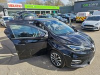 USED 2021 71 RENAULT ZOE Black R135 EV50 GT Line Hatchback, 39,533 miles, Rapid Charge Electric Automatic, Half leather, Sat Nav, Rear camera, Bluetooth, Air Conditioning . This 2021 Renault Zoe R135 GT Line is a superb example, having had only one owner since new. This electric hatchback boasts a 55 kWh battery offering a maximum range of 238 miles when new, making it ideal for both daily commutes and longer journeys. Charging is convenient, with a full charge at home using a 7kW charger taking  9 hours and 25 minutes, while rapid public charging can take you from empty to 80% in just 1 hour and 10 minutes. The vehicle comes with a 3 month warranty and a 12 month