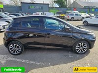 USED 2021 71 RENAULT ZOE Black R135 EV50 GT Line Hatchback, 39,533 miles, Rapid Charge Electric Automatic, Half leather, Sat Nav, Rear camera, Bluetooth, Air Conditioning . This 2021 Renault Zoe R135 GT Line is a superb example, having had only one owner since new. This electric hatchback boasts a 55 kWh battery offering a maximum range of 238 miles when new, making it ideal for both daily commutes and longer journeys. Charging is convenient, with a full charge at home using a 7kW charger taking  9 hours and 25 minutes, while rapid public charging can take you from empty to 80% in just 1 hour and 10 minutes. The vehicle comes with a 3 month warranty and a 12 month