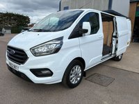USED 2022 22 FORD TRANSIT CUSTOM Limited L2 H1 2.0 300 EcoBlue LWB Diesel Panel Van Manual Euro 6 (s/s) (130 bhp) 3 Ford Main Dealer Services - last service on 13.03.2025 @ 74,999 miles - 91,635 miles - EURO 6, A/C, front & rear parking sensors, heated seats, alloys, heated screen, cruise control, Bluetooth, electric power folding mirrors, E/W, DAB Radio with Apple car play, start/stop, factory fitted bulkhead, colour coded, auto LED headlights, side loading door, ply lined with load liner, front fog lights, remote Central Locking, spare key, finance arranged, 6 months Premium AutoGuard warranty