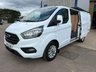 USED 2022 22 FORD TRANSIT CUSTOM Limited L2 H1 2.0 300 EcoBlue LWB Diesel Panel Van Manual Euro 6 (s/s) (130 bhp) 3 Ford Main Dealer Services - last service on 13.03.2025 @ 74,999 miles - 91,635 miles - EURO 6, A/C, front & rear parking sensors, heated seats, alloys, heated screen, cruise control, Bluetooth, electric power folding mirrors, E/W, DAB Radio with Apple car play, start/stop, factory fitted bulkhead, colour coded, auto LED headlights, side loading door, ply lined with load liner, front fog lights, remote Central Locking, spare key, finance arranged, 6 months Premium AutoGuard warranty