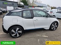 USED 2020 70 BMW I3 White 42.2kWh electric hatchback, 22,729 miles, Automatic, Sat nav, Apple CarPlay, DAB, Rear Sensors, Rear camera, 19in alloys. This 2020 BMW i3 presents an exceptional ownership proposition, having been cherished by just one owner from new and boasting remarkably low mileage for its age. As a fully electric vehicle, it offers a compelling blend of advanced technology and sustainable motoring. With a substantial 42 kWh battery, this i3 is capable of achieving up to 190 miles on a full charge, making it a practical choice for both daily commutes and longer journeys. Recharging is convenient, with a full charge at home usi