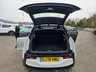 USED 2020 70 BMW I3 White 42.2kWh electric hatchback, 22,729 miles, Automatic, Sat nav, Apple CarPlay, DAB, Rear Sensors, Rear camera, 19in alloys. This 2020 BMW i3 presents an exceptional ownership proposition, having been cherished by just one owner from new and boasting remarkably low mileage for its age. As a fully electric vehicle, it offers a compelling blend of advanced technology and sustainable motoring. With a substantial 42 kWh battery, this i3 is capable of achieving up to 190 miles on a full charge, making it a practical choice for both daily commutes and longer journeys. Recharging is convenient, with a full charge at home usi
