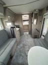 USED 2023 MERCEDES-BENZ COACHMAN Kabe 545 Travelmaster Coachman - ABSOLUTE SHOWSTOPPER!, delivery miles only!! 5 berth with Island bed - This stunning motorhome provides supreme luxury with functionality throughout. Upon entering your feet will sink into the plush carpets and an immediate feeling of space in the dining room/ lounge area which conveniently converts into a double bed, having a hydraulic drop down bed above which neatly stows away when not in use. Kitchen area is fully equipped with Dometic appliances including large fridge freezer, microwave, oven, grill, hob and sink. Moving towards the rear of the motorhome we have a separate shower and toilet with the Island bed at the back. Air conditioning unit is situated in the bedroom area for your comfort on warm days. Underneath the bed is a garage area which is accessible via outside locker doors on both sides. Reversing camera is included within the extensive functions of the Mercedes infotainment system. This must be seen to be fully appreciated! Yours for �&pound;95,995 - MASSIVE saving on the new model!! Up to 7 year finance and warranty packages available. DIMENSIONS - LENGTH - 8.4M, WIDTH 2.78M, HEIGHT 2.98M 