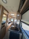 USED 2022 FIAT SWIFT SELECT 122 - 2 Berth lovely modern layout, end lounge area which can be used as two single beds (186cm (L) x 66cm (W) easily converts into double bed, galley kitchen including Dometic fridge, Thetford hob, oven, grill and sink. Wet room bathroom with stow away sink for extra space. Lots of storage space and captains swivel seats turn to create a cute little dining area. Fitted with Reversing camera, tow bar, external gas BBQ point, external shower. Yours for �&pound;55,995. Up to 7 years finance and warranty packages available. DIMENSIONS - LENGTH - 5.95M, WIDTH 2.26M, HEIGHT - 2.72M  