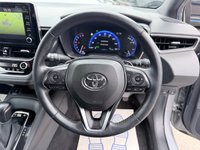 USED 2020 70 TOYOTA COROLLA Grey 2.0 VVT-h Design Touring Sports, 74,973 miles, ULEZ compliant, Hybrid auto, 8in Touchscreen, CarPlay/Android Auto, Sat Nav, Rear Camera, A/C. This 2020 Toyota Corolla VVT-h Design boasts an impressive service history with its last service completed on 30th October 2025 at 58,505 miles, offering peace of mind for its next owner. This Euro 6 compliant model features a powerful yet efficient 2.0L petrol hybrid engine, paired with the Design trim for a refined driving experience. You'll also benefit from a 3 month warranty and a 12 month MOT provided on purchase, ensuring roadworthiness.  Experience enhanced comfort and convenience with h