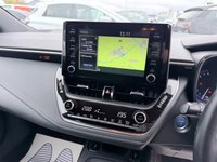 USED 2020 70 TOYOTA COROLLA Grey 2.0 VVT-h Design Touring Sports, 74,973 miles, ULEZ compliant, Hybrid auto, 8in Touchscreen, CarPlay/Android Auto, Sat Nav, Rear Camera, A/C. This 2020 Toyota Corolla VVT-h Design boasts an impressive service history with its last service completed on 30th October 2025 at 58,505 miles, offering peace of mind for its next owner. This Euro 6 compliant model features a powerful yet efficient 2.0L petrol hybrid engine, paired with the Design trim for a refined driving experience. You'll also benefit from a 3 month warranty and a 12 month MOT provided on purchase, ensuring roadworthiness.  Experience enhanced comfort and convenience with h
