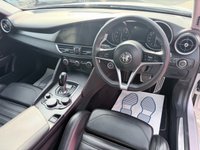USED 2019 19 ALFA ROMEO GIULIA Grey 2.0T Veloce Euro 6 saloon, 75,150 miles, ULEZ compliant, Automatic, Leather, Sat nav, CarPlay/Android Auto, Climate, Cruise, DAB, 18in Alloys. This 2019 Alfa Romeo Giulia T Veloce offers a compelling blend of performance and technology, presented with a 3 month warranty for your peace of mind. As a Euro 6 compliant vehicle, it features a potent 2.0 litre petrol engine and is equipped with 18 inch dark finish alloy wheels, Bi-Xenon headlamps with LED daytime running lights, and the Convenience Pack which includes keyless entry. Inside, you will find the Alfa Connect 3D Nav 8.8 inch infotainment system, complete with Bluetooth connectivi