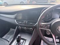 USED 2019 19 ALFA ROMEO GIULIA Grey 2.0T Veloce Euro 6 saloon, 75,150 miles, ULEZ compliant, Automatic, Leather, Sat nav, CarPlay/Android Auto, Climate, Cruise, DAB, 18in Alloys. This 2019 Alfa Romeo Giulia T Veloce offers a compelling blend of performance and technology, presented with a 3 month warranty for your peace of mind. As a Euro 6 compliant vehicle, it features a potent 2.0 litre petrol engine and is equipped with 18 inch dark finish alloy wheels, Bi-Xenon headlamps with LED daytime running lights, and the Convenience Pack which includes keyless entry. Inside, you will find the Alfa Connect 3D Nav 8.8 inch infotainment system, complete with Bluetooth connectivi