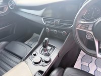 USED 2019 19 ALFA ROMEO GIULIA Grey 2.0T Veloce Euro 6 saloon, 75,150 miles, ULEZ compliant, Automatic, Leather, Sat nav, CarPlay/Android Auto, Climate, Cruise, DAB, 18in Alloys. This 2019 Alfa Romeo Giulia T Veloce offers a compelling blend of performance and technology, presented with a 3 month warranty for your peace of mind. As a Euro 6 compliant vehicle, it features a potent 2.0 litre petrol engine and is equipped with 18 inch dark finish alloy wheels, Bi-Xenon headlamps with LED daytime running lights, and the Convenience Pack which includes keyless entry. Inside, you will find the Alfa Connect 3D Nav 8.8 inch infotainment system, complete with Bluetooth connectivi