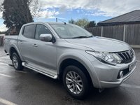 USED 2019 19 MITSUBISHI L200 2.4 DI-D DC Warrior Pickup Double Cab 4dr Diesel Auto 4WD Euro 6 (178 ps) With only one owner and exceptionally low mileage for its age, this 2019 Mitsubishi L200 2.4 DI-D DC Warrior Pickup Double Cab presents a superb opportunity. This Euro 6 compliant, four wheel drive diesel automatic boasts a powerful 2.4 litre engine and a substantial towing weight of 3100 kg, making it a capable workhorse. Its clear vehicle history check provides peace of mind, while notable features include Bi-Xenon HID headlamps, front seat heaters, a rear view camera, automatic light sensors.