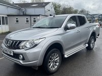 USED 2019 19 MITSUBISHI L200 2.4 DI-D DC Warrior Pickup Double Cab 4dr Diesel Auto 4WD Euro 6 (178 ps) With only one owner and exceptionally low mileage for its age, this 2019 Mitsubishi L200 2.4 DI-D DC Warrior Pickup Double Cab presents a superb opportunity. This Euro 6 compliant, four wheel drive diesel automatic boasts a powerful 2.4 litre engine and a substantial towing weight of 3100 kg, making it a capable workhorse. Its clear vehicle history check provides peace of mind, while notable features include Bi-Xenon HID headlamps, front seat heaters, a rear view camera, automatic light sensors.