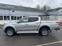 USED 2019 19 MITSUBISHI L200 2.4 DI-D DC Warrior Pickup Double Cab 4dr Diesel Auto 4WD Euro 6 (178 ps) With only one owner and exceptionally low mileage for its age, this 2019 Mitsubishi L200 2.4 DI-D DC Warrior Pickup Double Cab presents a superb opportunity. This Euro 6 compliant, four wheel drive diesel automatic boasts a powerful 2.4 litre engine and a substantial towing weight of 3100 kg, making it a capable workhorse. Its clear vehicle history check provides peace of mind, while notable features include Bi-Xenon HID headlamps, front seat heaters, a rear view camera, automatic light sensors.