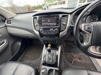 USED 2019 19 MITSUBISHI L200 2.4 DI-D DC Warrior Pickup Double Cab 4dr Diesel Auto 4WD Euro 6 (178 ps) With only one owner and exceptionally low mileage for its age, this 2019 Mitsubishi L200 2.4 DI-D DC Warrior Pickup Double Cab presents a superb opportunity. This Euro 6 compliant, four wheel drive diesel automatic boasts a powerful 2.4 litre engine and a substantial towing weight of 3100 kg, making it a capable workhorse. Its clear vehicle history check provides peace of mind, while notable features include Bi-Xenon HID headlamps, front seat heaters, a rear view camera, automatic light sensors.
